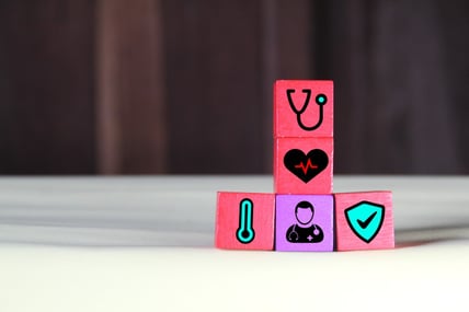 stacked-block-of-medical-symbols-on-table
